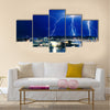 Multiple eletric lightning strikes over river Multi Panel Canvas Wall Art