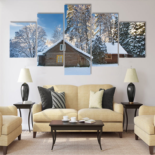 Old houses in snowy forest Multi panel canvas wall art