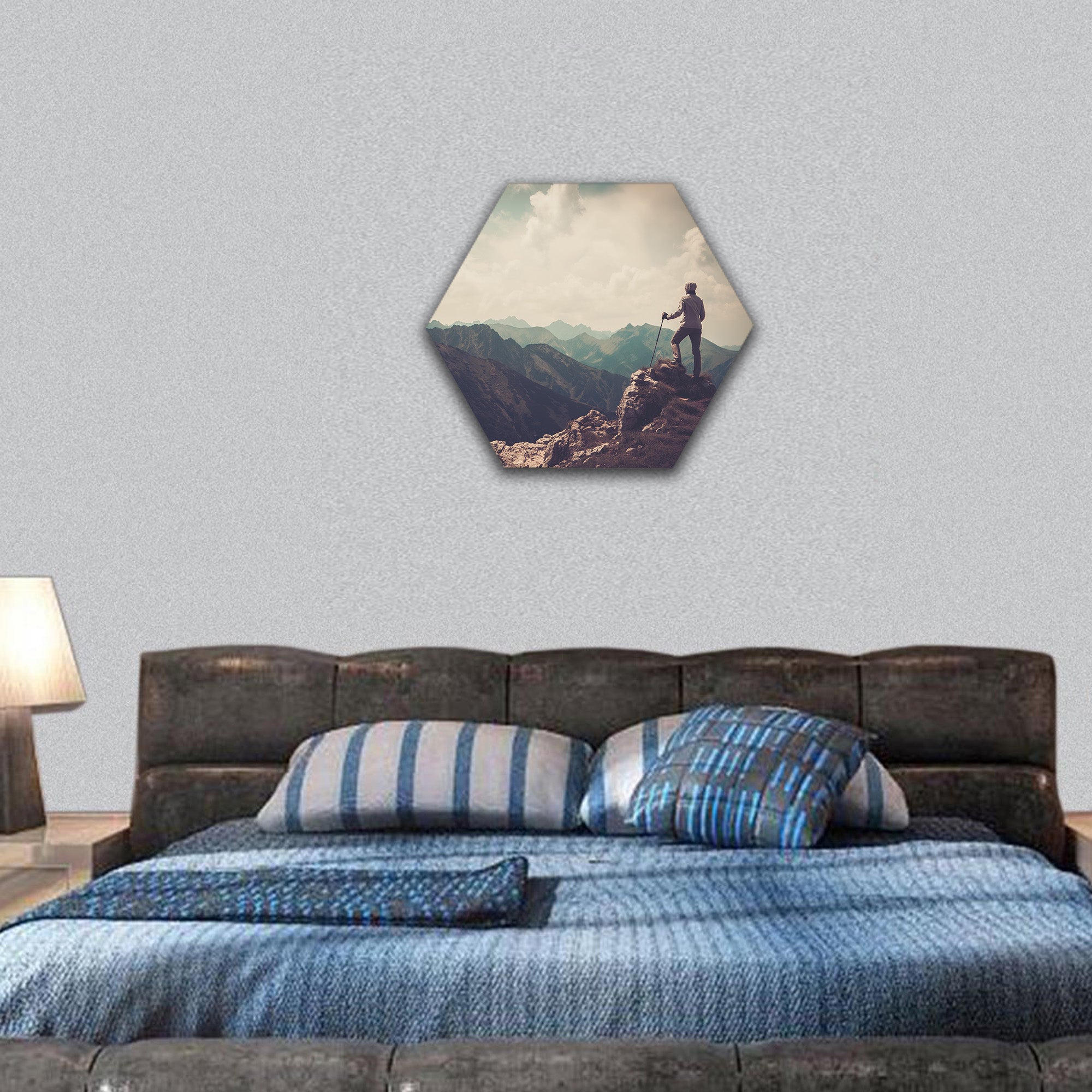 Woman hiker on a top of a mountain hexagonal canvas wall art