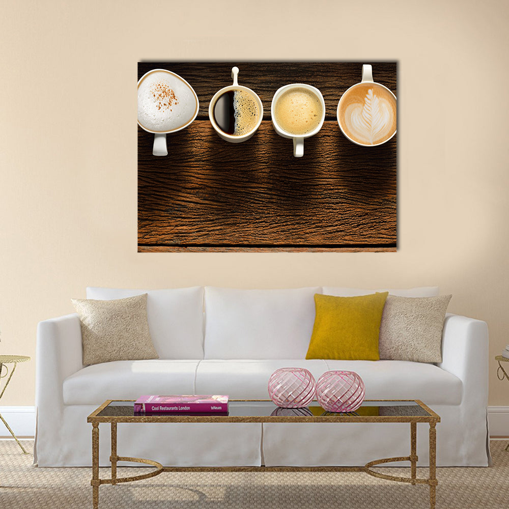 Variety of cups of coffee on old wooden table Multi Panel Canvas Wall Art