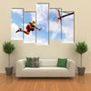 Young man jumping and playing street ball basketball Urban authentic Multi panel canvas wall art