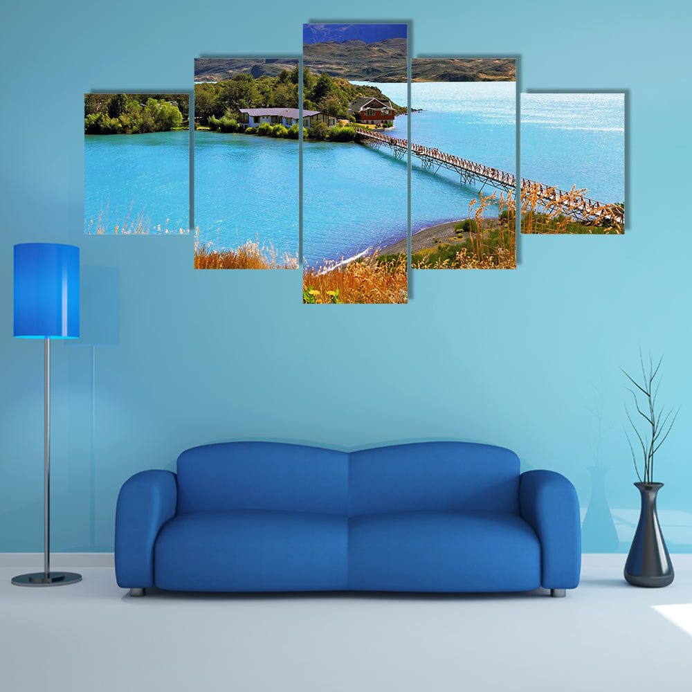Picturesque little island in the lake Pehoe multi panel canvas wall art