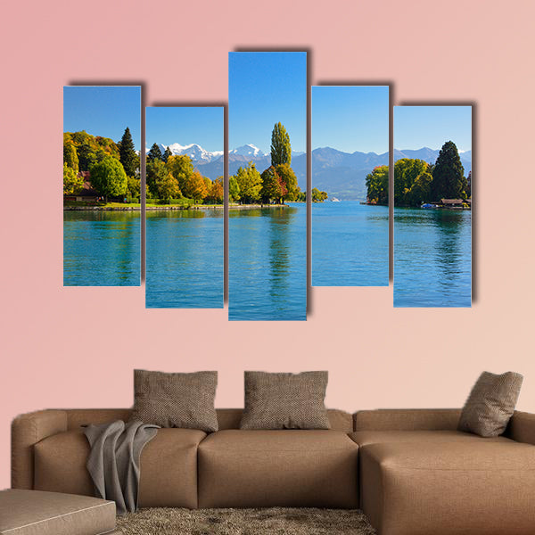 Lake Thun with Jungfrau Mountain in autumn on clear blue sky, Switzerland, Shot using CPL filter Multi panel canvas wall art