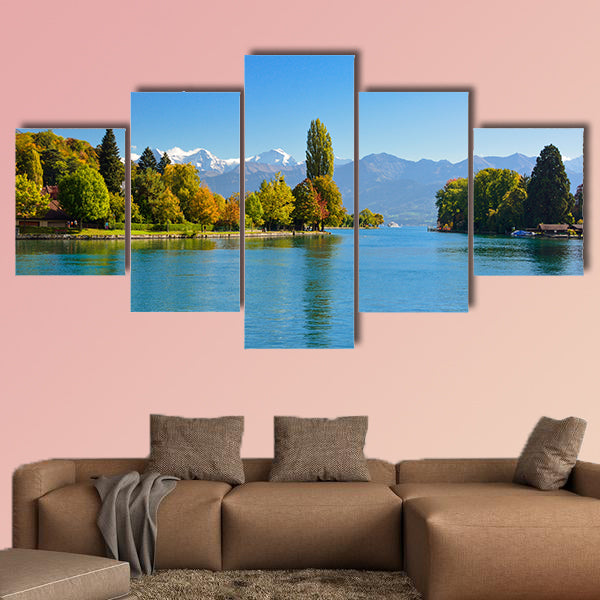 Lake Thun with Jungfrau Mountain in autumn on clear blue sky, Switzerland, Shot using CPL filter Multi panel canvas wall art