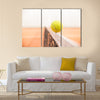 Tennis ball hitting the net Multi panel canvas wall art