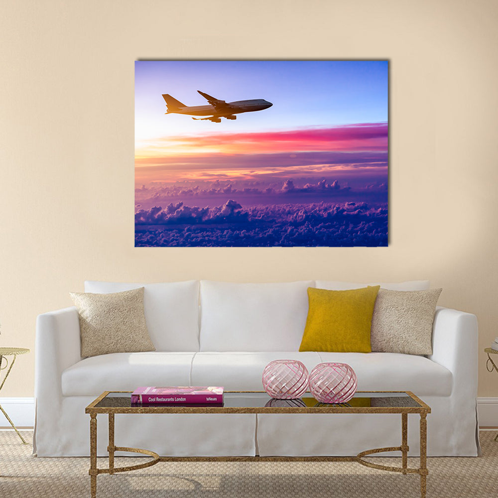 Airplane in the sky at sunrise multi panel canvas wall art