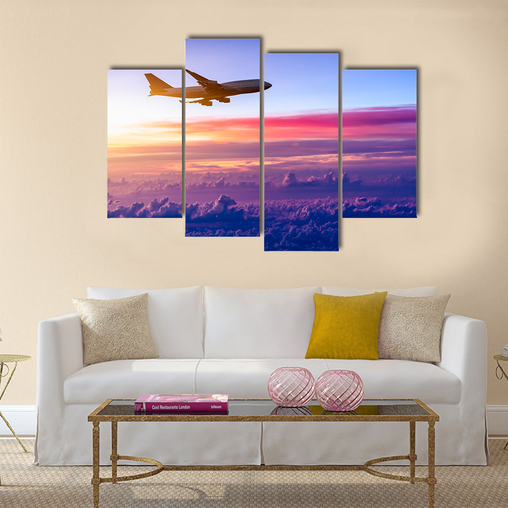 Airplane in the sky at sunrise multi panel canvas wall art