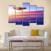 Airplane in the sky at sunrise multi panel canvas wall art