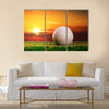 Golf ball on the lawn in sunset lights Multi Panel Canvas Wall Art