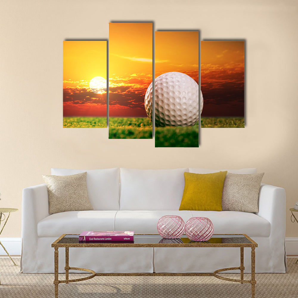 Golf ball on the lawn in sunset lights Multi Panel Canvas Wall Art
