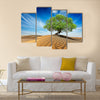 Lonely green tree in desert dunes Multi panel canvas wall art