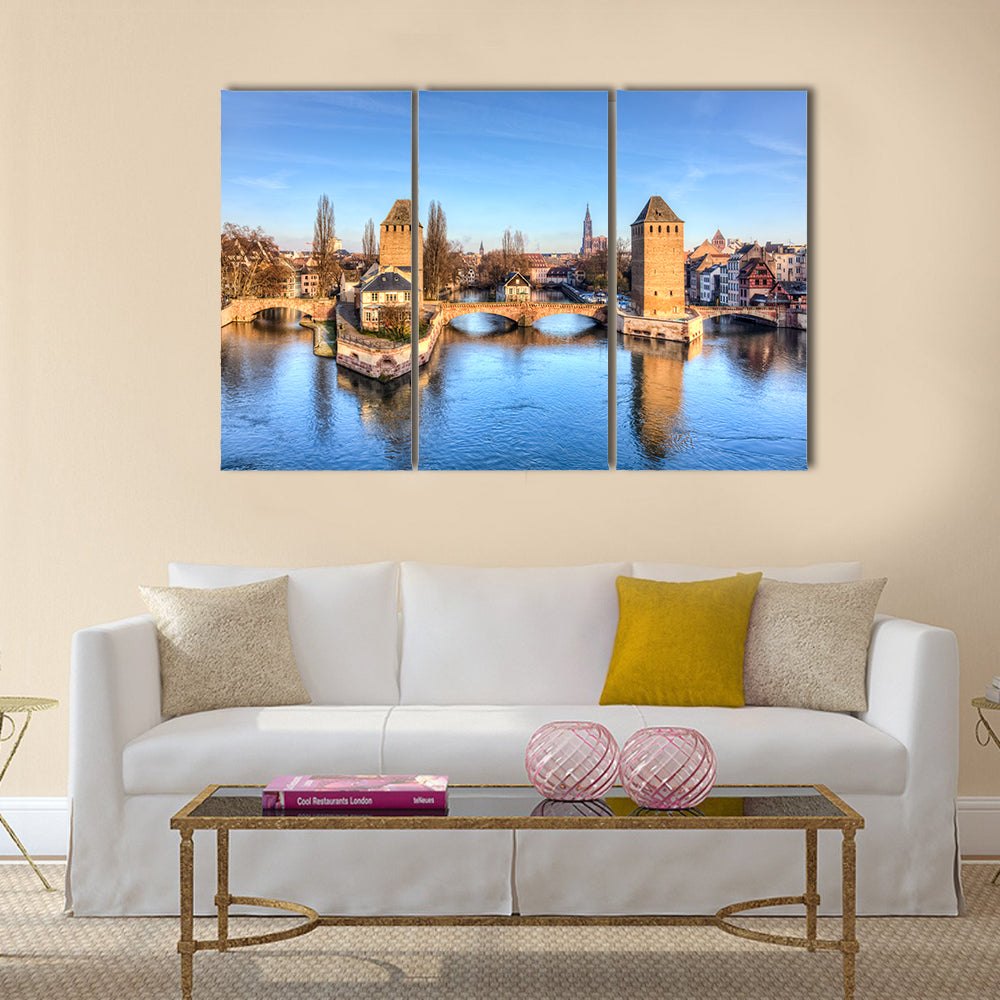 Winter panorama of the famous bridges Ponts Couverts in Strasbourg, France multi panel canvas wall art