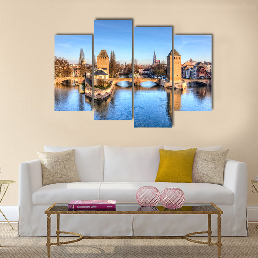Winter panorama of the famous bridges Ponts Couverts in Strasbourg, France multi panel canvas wall art