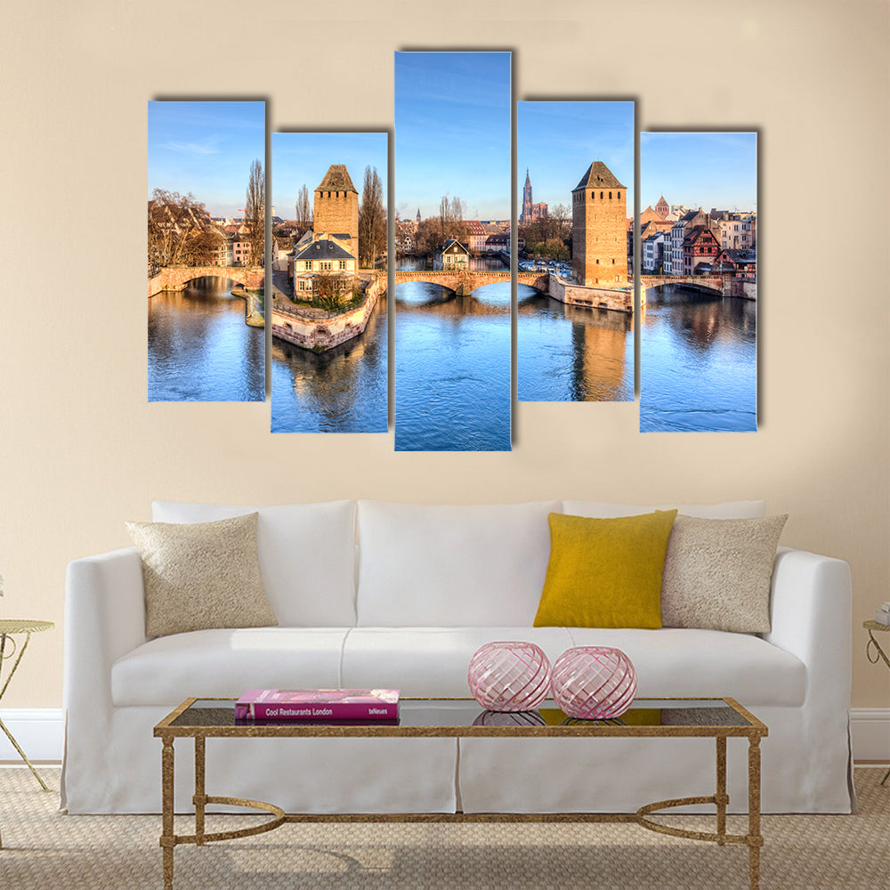 Winter panorama of the famous bridges Ponts Couverts in Strasbourg, France multi panel canvas wall art
