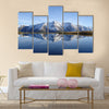 Reflection in the water of the quiet and beautiful Bettmersee Lake Multi panel canvas wall art