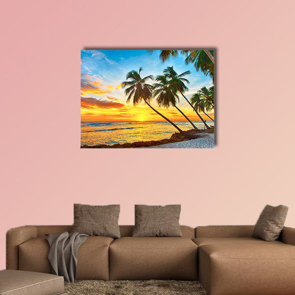 Beautiful sunset over the sea with a view at palms wall art