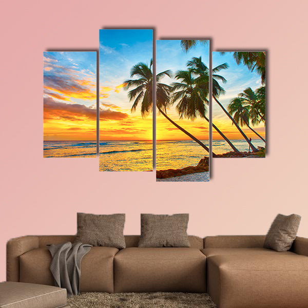 Beautiful sunset over the sea with a view at palms wall art