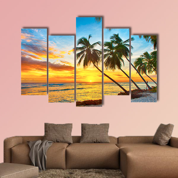 Beautiful sunset over the sea with a view at palms wall art