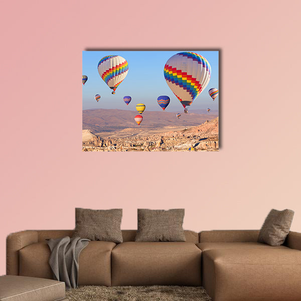 Balloons flying over rock landscape multi panel canvas wall art