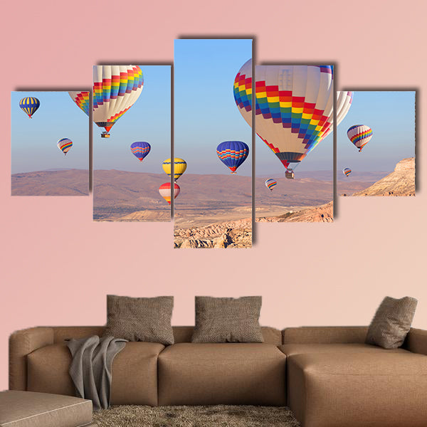 Balloons flying over rock landscape multi panel canvas wall art