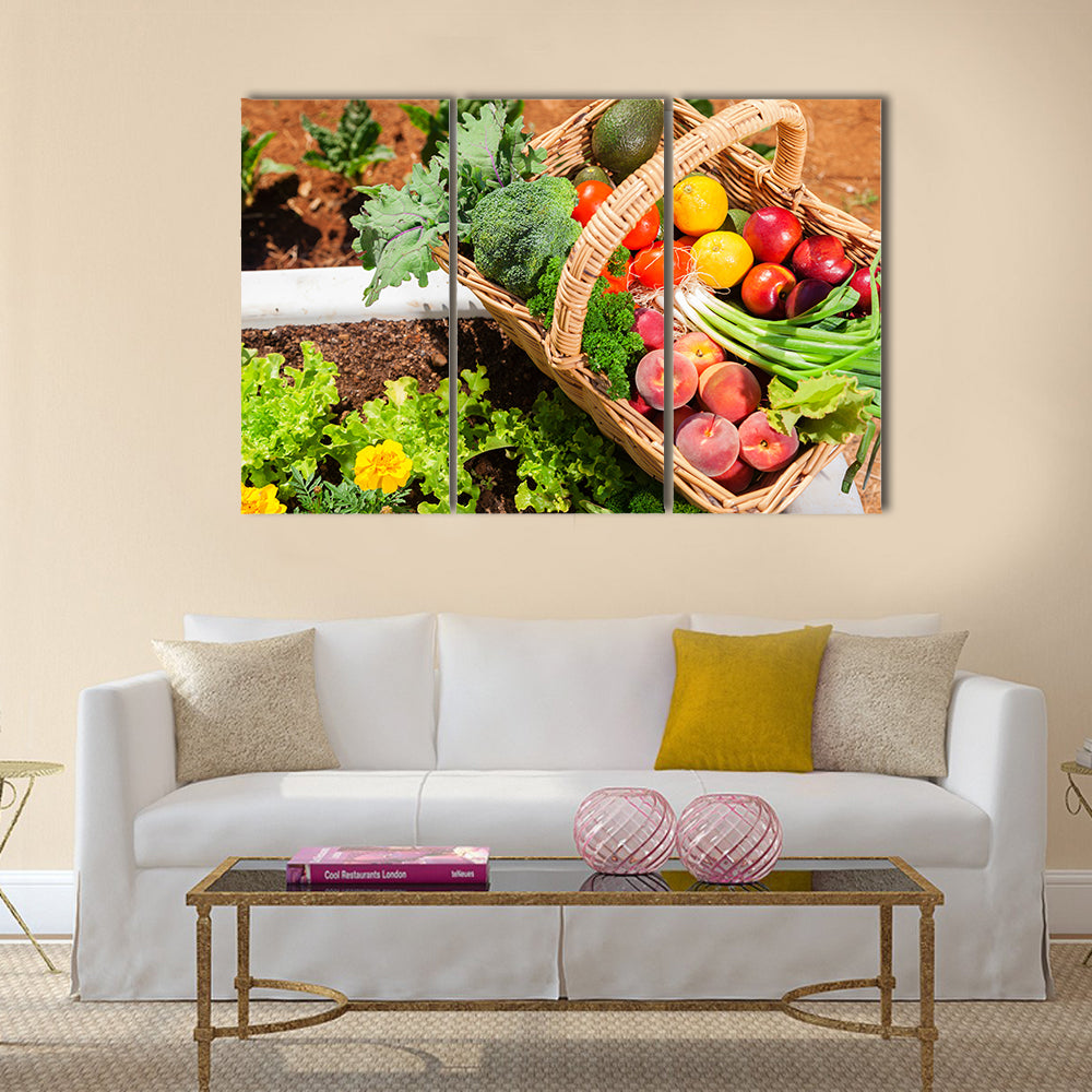 Basket of fresh organic fruit and vegetables in garden Multi panel canvas wall art