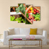 Basket of fresh organic fruit and vegetables in garden Multi panel canvas wall art