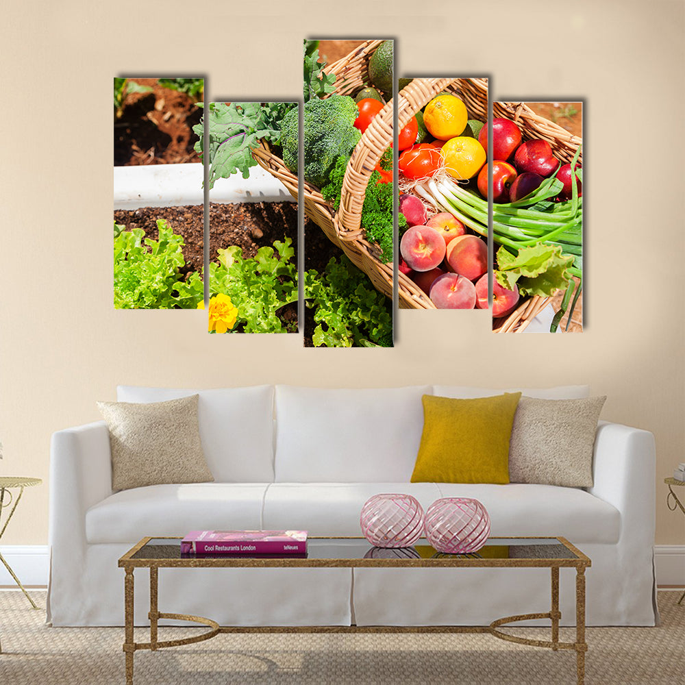 Basket of fresh organic fruit and vegetables in garden Multi panel canvas wall art