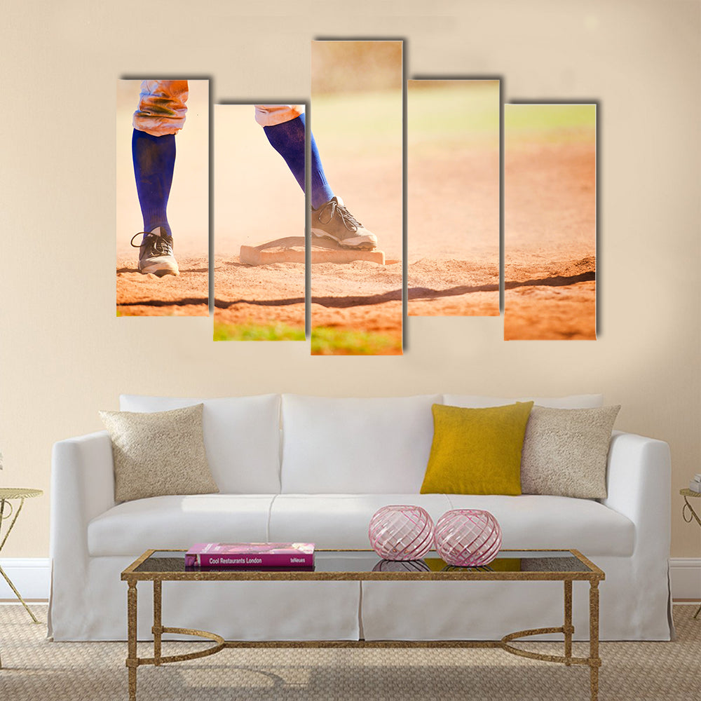 Baseball player wearing blue socks standing on a baseball base Multi panel canvas wall art