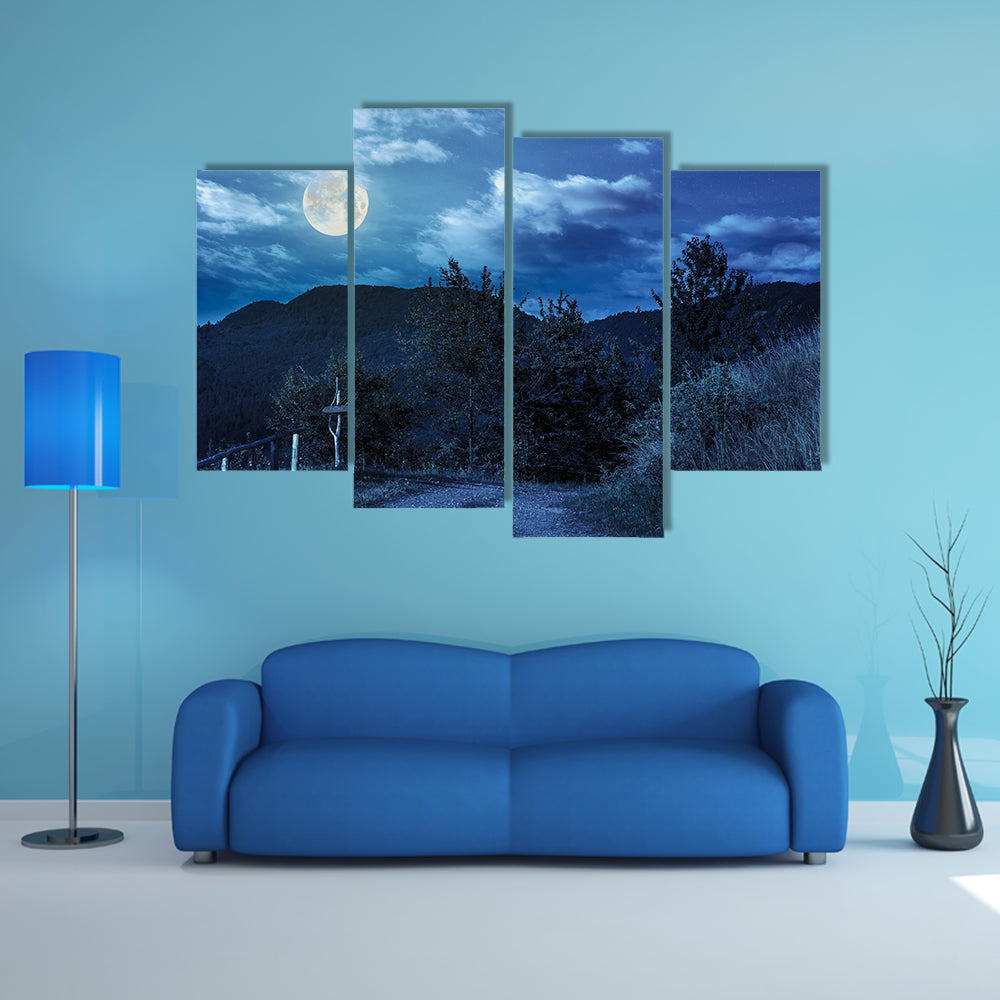 Summer landscape With A Fence Near The Path On The Hillside In High Mountain At Night In Full Moon Multi Panel Canvas Wall Art