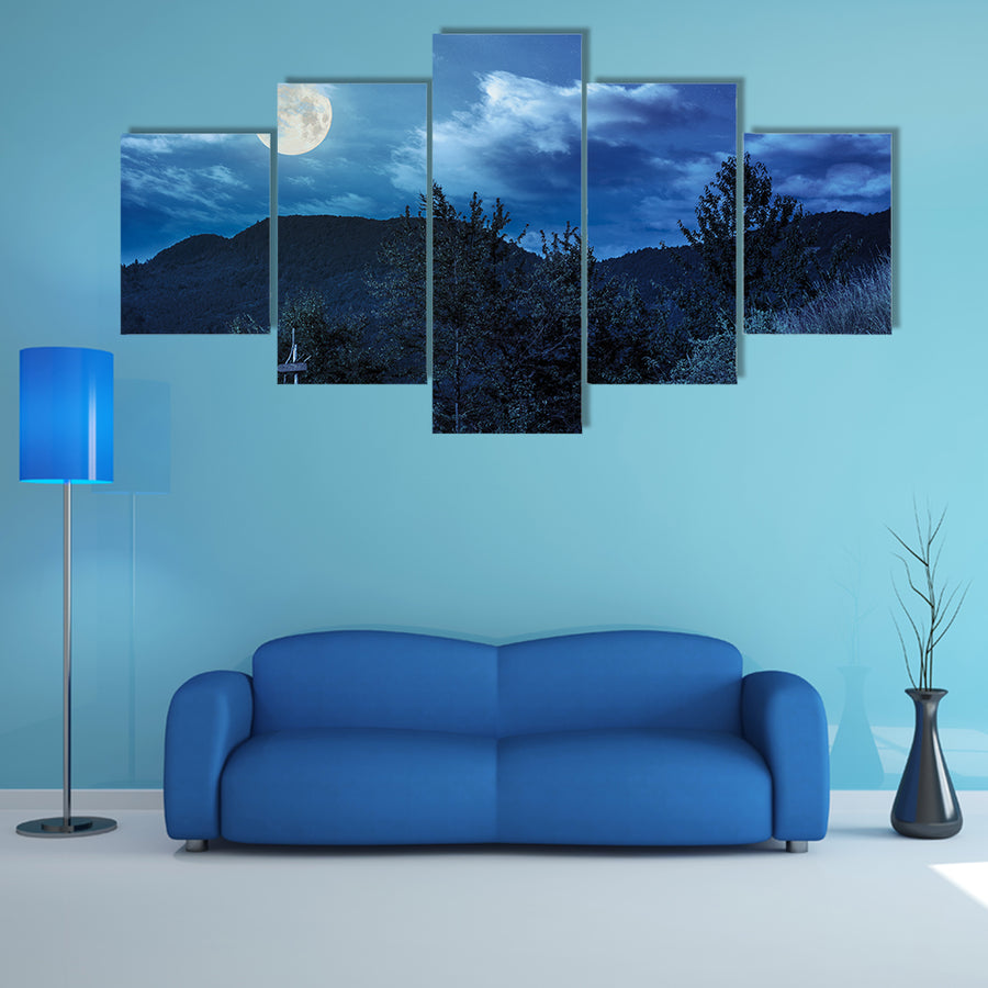 Summer landscape With A Fence Near The Path On The Hillside In High Mountain At Night In Full Moon Multi Panel Canvas Wall Art