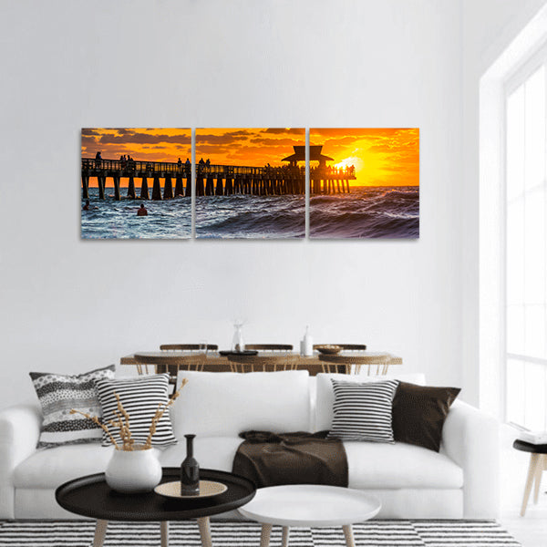 Sunset over fishing pier and Gulf of Mexico in Naples, Florida panoramic canvas wall art