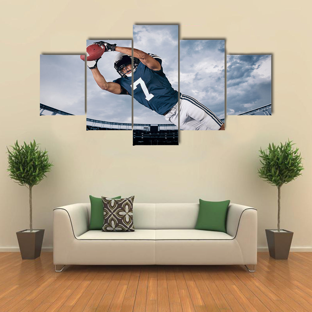 American Football Player catching a touchdown Pass Multi panel canvas wall art