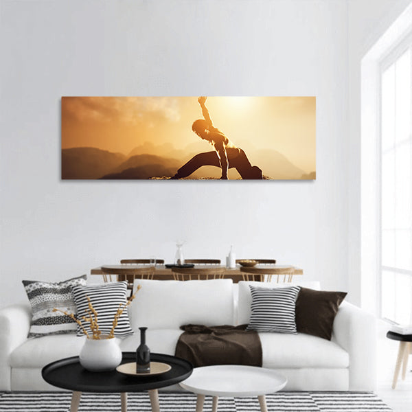 Asian man, fighter practices martial arts in mountains at sunset panoramic canvas wall art