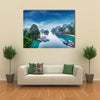 Tourist junks floating among limestone rocks at Ha Long Bay South China Sea Vietnam Southeast Asia Multi panel canvas wall art