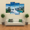 Tourist junks floating among limestone rocks at Ha Long Bay South China Sea Vietnam Southeast Asia Multi panel canvas wall art