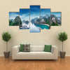 Tourist junks floating among limestone rocks at Ha Long Bay South China Sea Vietnam Southeast Asia Multi panel canvas wall art