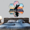 Young surfer with board on the beach hexagonal canvas wall art