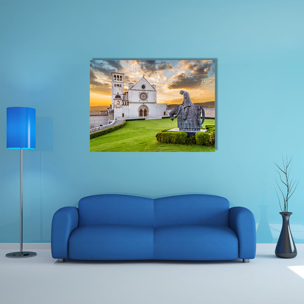 Famous Basilica of St Francis of Assisi with statue at sunset in Assisi, Umbria, Italy multi panel canvas wall art