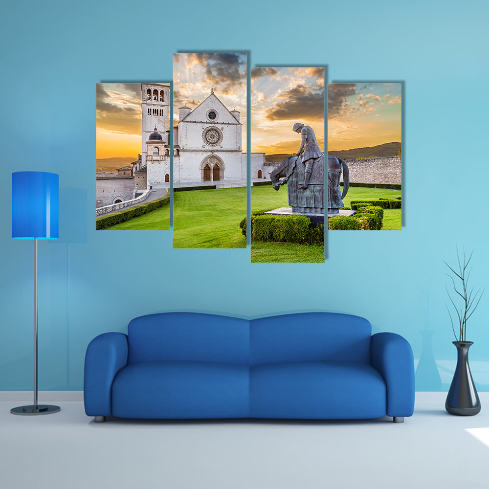 Famous Basilica of St Francis of Assisi with statue at sunset in Assisi, Umbria, Italy multi panel canvas wall art