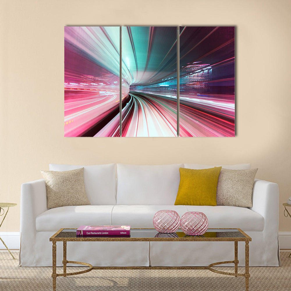 Automated guide-way train at night in Japan Multi Panel Canvas Wall Art