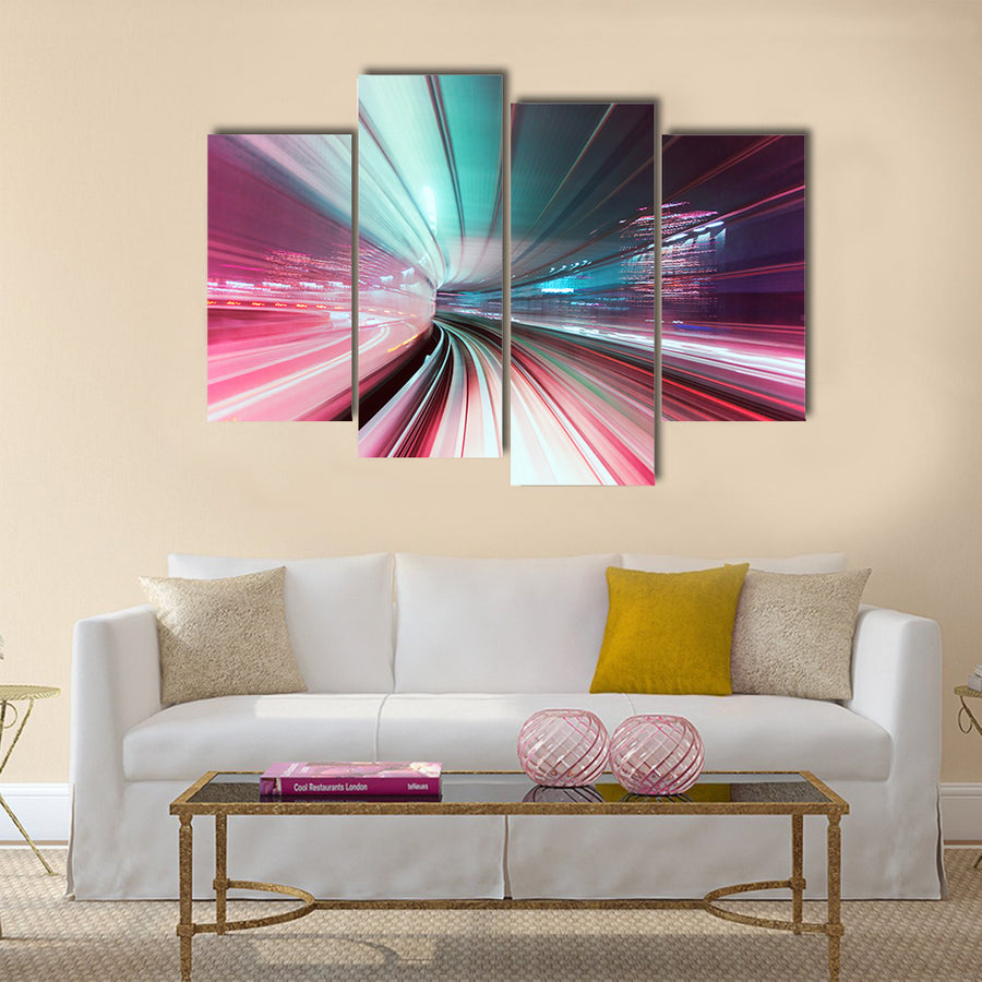 Automated guide-way train at night in Japan Multi Panel Canvas Wall Art