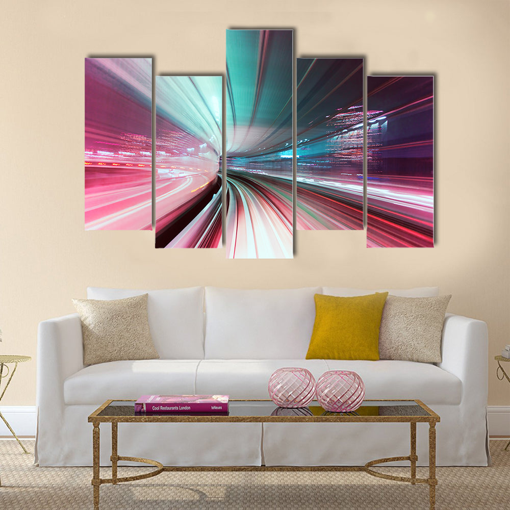 Automated guide-way train at night in Japan Multi Panel Canvas Wall Art
