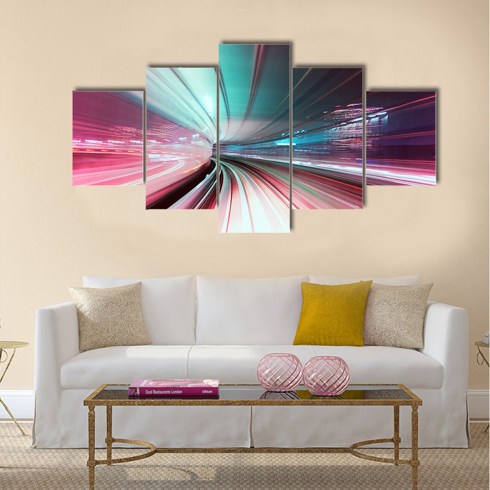 Automated guide-way train at night in Japan Multi Panel Canvas Wall Art