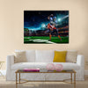 American football player in action on the stadium Multi panel canvas wall art