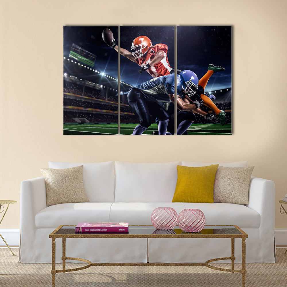 Strong American football player in action on the stadium Multi panel canvas wall art