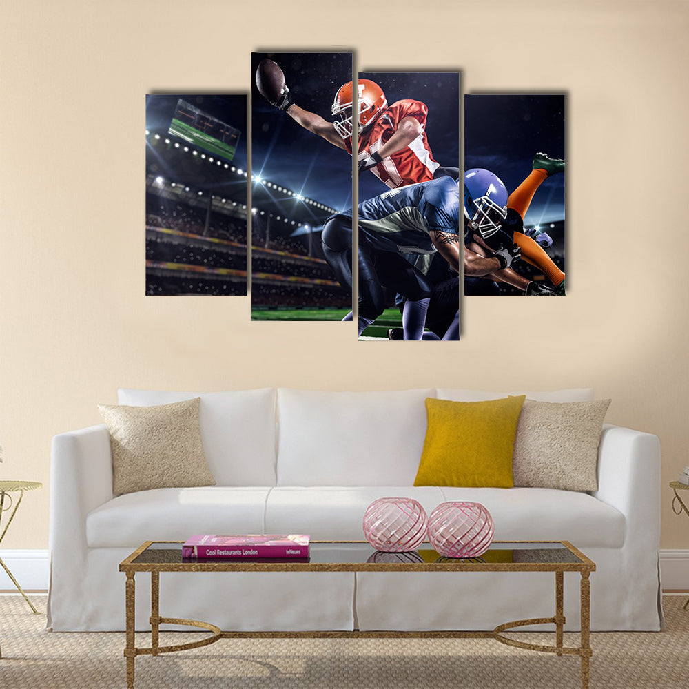 Strong American football player in action on the stadium Multi panel canvas wall art