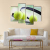 A set of tennis. Racket and ball. Studio shot Multi panel canvas wall art