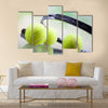 A set of tennis. Racket and ball. Studio shot Multi panel canvas wall art