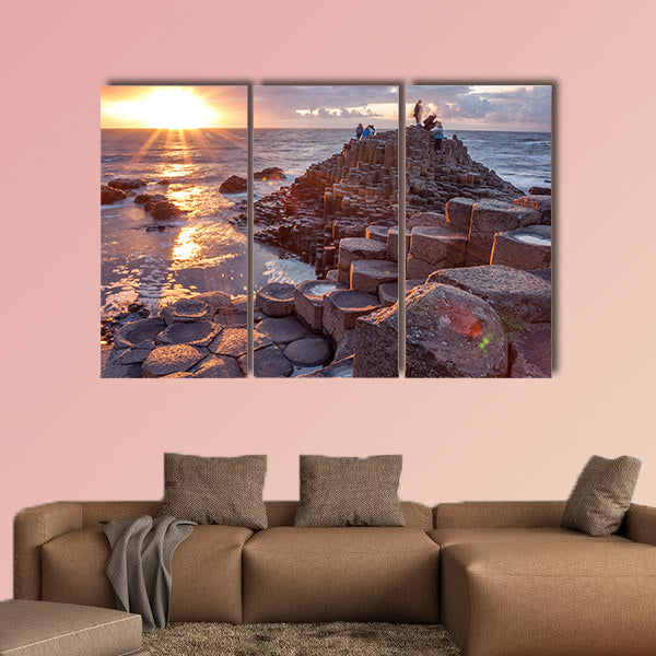 People visiting Giant s Causeway at the sunset in North Antrim, wall art