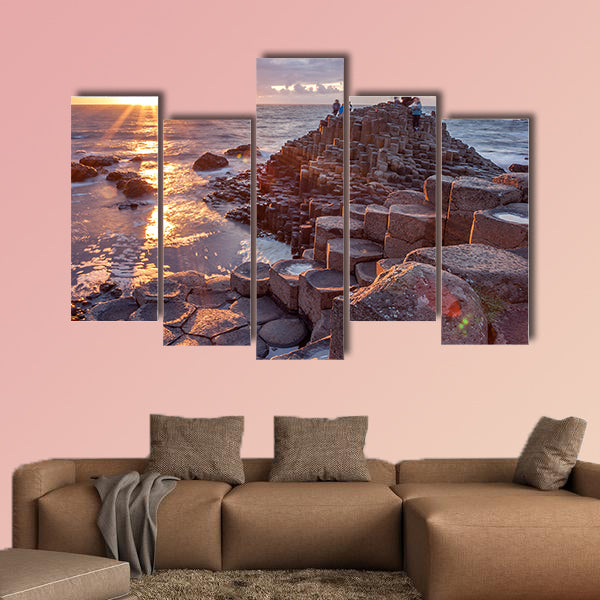 People visiting Giant s Causeway at the sunset in North Antrim, wall art